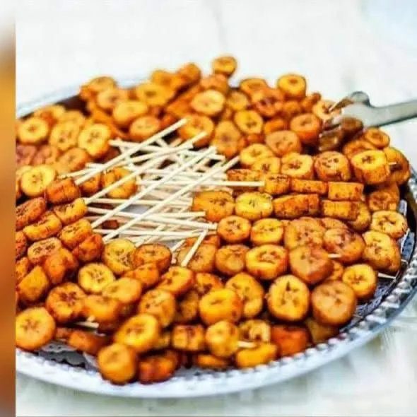 Fried plantain bites arranged for serving.